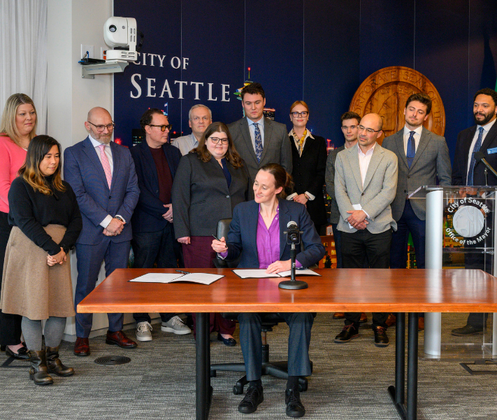 Seattle Mayor Wilson signs SEPA reform legislation.
