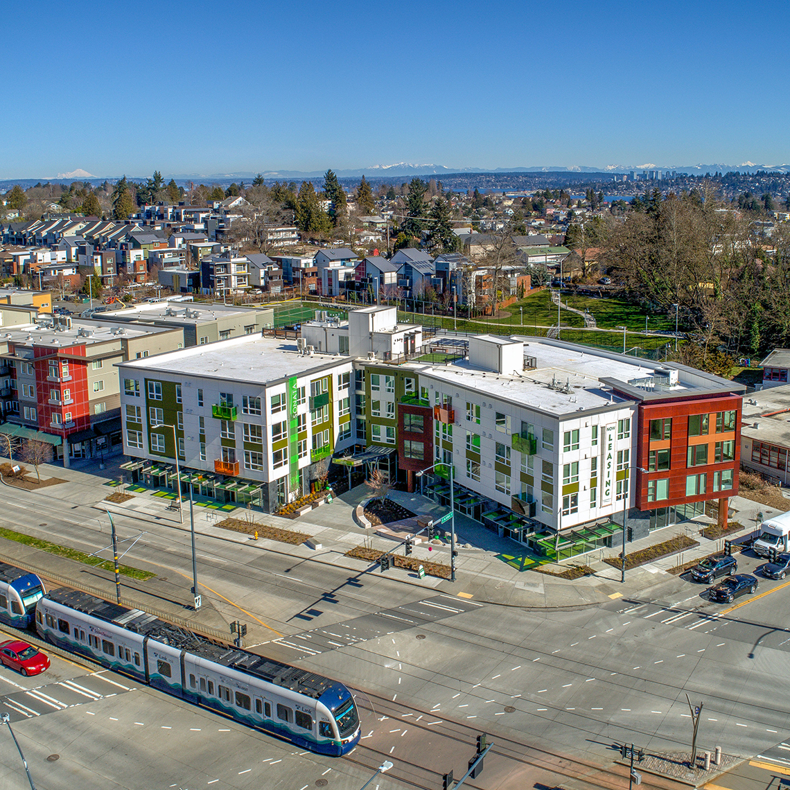 BDR Sonata transit-oriented apartment building adjacent to light rail, photo credit Heiser Media